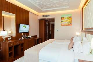 Отель Garden Park Inn Алматы Улучшенный двухместный номер Делюкс с 1 кроватью или 2 отдельными кроватями-2